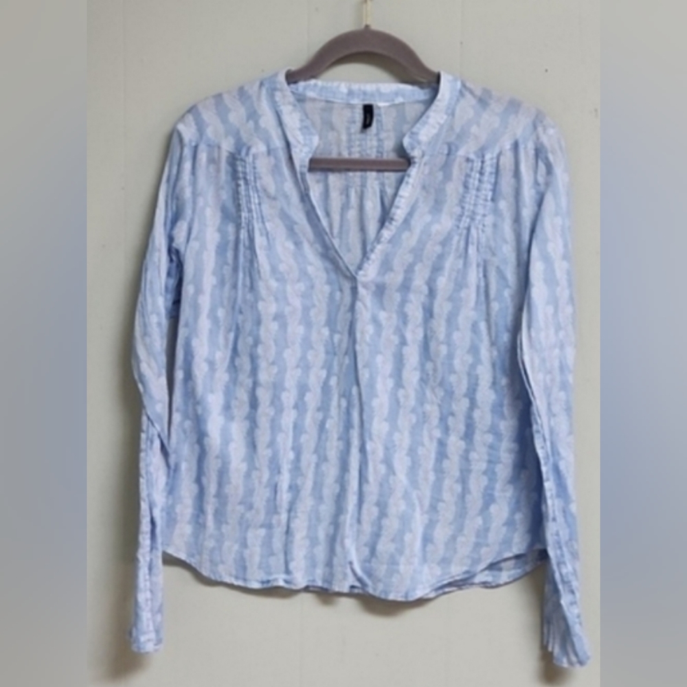 J Crew.  Blue with white vertical floral print. Chest measures 21.5.